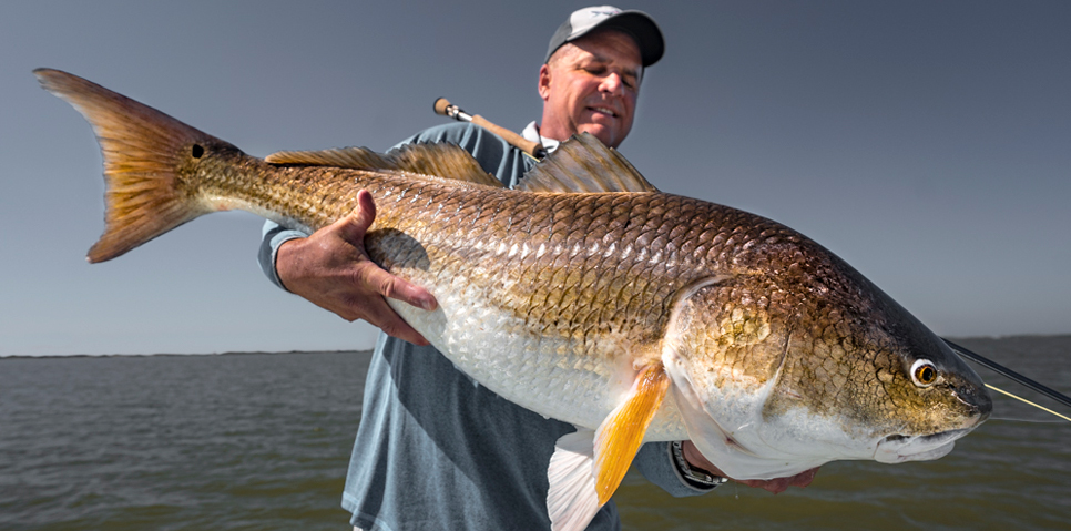 Nev and Keith with their stunning Louisiana Red Fish