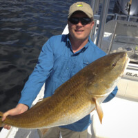 captain Jason guides to a huge red in Panama City beach captain Jason guides to a huge red in Panama City beach