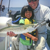 captain Jeff poses with his young angler captain Jeff poses with his young angler